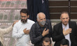 Iranian men and a cleric beat themselves in a mosque in northern Tehran while taking part...