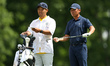 Doug Ghim of the USA interacts with his caddy during the final round of The Memorial Tourn...