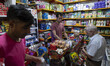 An Iranian man shops at a small local supermarket near the Shapour Bazaar (Market) in sout...
