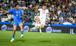 Hungary's Roland Sallai tries to score a goal hindered by Italy's Davide Calabria during t...