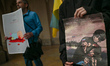 Members of the local Ukrainian diaspora, war refugges, peace activists, volunteers and loc...