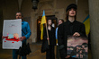 Members of the local Ukrainian diaspora, war refugges, peace activists, volunteers and loc...