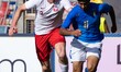 Jakub Szymanski of Poland U20 and Jacopo Desogus of Italy U20 in action during the Interna...