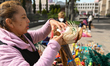June 16, 2022, Toluca, Mexico: Craftswomen offers their different palm products outside of...