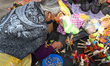 June 16, 2022, Toluca, Mexico: Craftswomen offers their different palm products outside of...