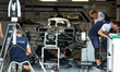 Scuderia AlphaTauri AT03, mechanical detail of mechanics working in the garage, box, durin...