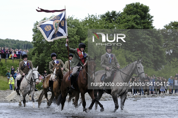 Selkirk, UK. 17.Jun.2022.  
Selkirk Common Riding 2022. Friday.
Adam Nichol, Selkirk Royal Burgh Standard Bearer, 2022, flanked by his Atten...