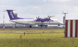 Flybe Bombardier DHC-8-400 turboprop aircraft as seen landing at Amsterdam Schiphol Airpor...