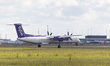 Flybe Bombardier DHC-8-400 turboprop aircraft as seen landing at Amsterdam Schiphol Airpor...