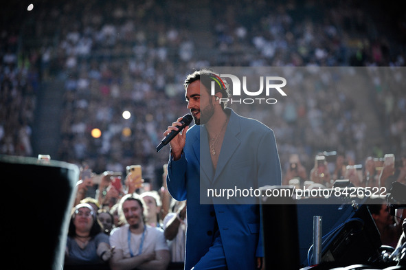 Marco Mengoni singing on the stage-milan san siro during the Italian singer Music Concert Marco Mengoni on June 19, 2022 at the San Siro sta...