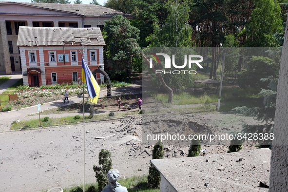 KHARKIV, UKRAINE - JUNE 20, 2022 - A crater left by a Russian rocket is pictured near the Kharkiv State Zooveterinary Academy in Mala Danyli...
