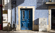 The entrance of a typical house with azulejos facade in the city center of Tomar, Portugal...
