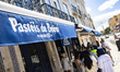 People queue in front of the historical shop Pasteleria de Belem in Lissabon, Portugal on...