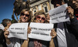 Demonstrators take part in a rally to support Rome's Mayor Ignazio Marino and to ask him n...