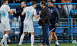 Zenit St. Petersburg head coach Sergei Semak (2nd R) and Zelimkhan Bakaev (7) celebrate vi...