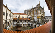 View on the guesthouse cloister and church in the Convent of Christ in Tomar, Portugal on...