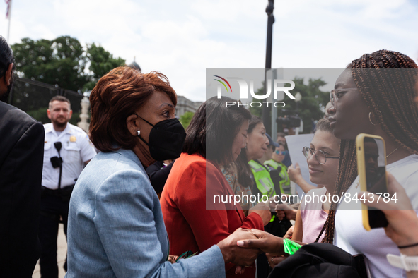 Congresswoman Maxine Waters (D-CA) speaks with supporters after a large number of Congresswomen came to the Supreme Court vowing to fight fo...