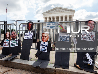 Effigies of the six conservative Supreme Court justices stand in front of the Court before it Supreme Court announces its opinion on Dobbs v...