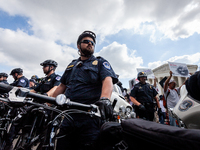 Officer S. Falcone and other Capitol Police bicycle officers maintain sercurity before the Supreme Court issues its opinion on Dobbs v. JWHO...