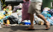 Dumpsters full of rubbish still on the streets, in the Ostiense district, after the 15 Jun...