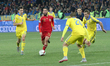 Isco (C) of Spain national team vies with Taras Stepanenko, Oleksandr Kucher and Yaroslav...