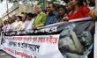 Garment workers take part in a rally in front of press club organized by United Federation...