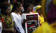 Garment workers take part in a rally in front of press club organized by United Federation...