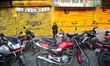 A man awaits to refuel petrol in Balkhu fuel station, Kathmandu, Nepal on 13 October, 2015...