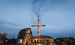 Rome, Italy – April 18, 2014: A cross is lighten before the start of the Via Crucis (Way o...