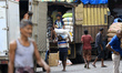 Sri Lankan daily wage workers are seen at  the commercial market at Pettah, Colombo, Sri L...
