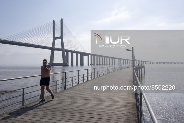 People are seen performing outdoor activities near the Herois do Mar promenade, in the vicinity of the Vasco da Gama bridge. Lisbon 03 July...