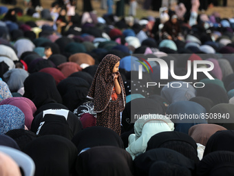 Palestinian women and children perform the al-Adha feast prayers in Gaza City, on the first day of the feast celebrated by Muslims worldwide...