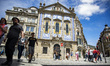 People walk in front of the Church Santo Antonio dos Congregados in Porto, Portugal on Jun...