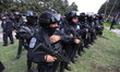 National Guard and anti-riot police during an operative after the shooting due to a confro...