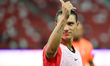 Darwin Nunez of Liverpool FC gestures as he walks around the field to show appreciation to...