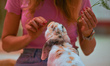 Natalia feeds rabbits during their 'siesta' time inside the Bunny Cafe in Krakow.Natalia...