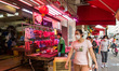 Hong Kong, China, 16 Jul 2022, Customers pass in front of a meat stall in Yuen Long. 