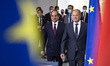 German Chancellor Olaf Scholz (R) and Egyptian President Abdel Fattah el-Sisi (L) arrive t...