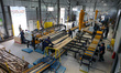 IVANO-FRANKIVSK REGION, UKRAINE - JULY 16, 2022 - Employees are seen at work at a new wood...