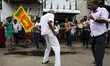 Supporters of newly elected Sri Lankan President Ranil Wickremesinghe celebrate in Colombo...