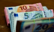 Bills of 10, 5 and 20 euros. Illustration pictures of bills and coins in euro. Cours-la-Vi...