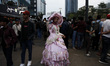 A young woman wearing a princess costume pose around the Dukuh Atas MRT Station which rece...