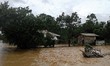 (151019) -- NUEVA ECIJA, Oct. 19, 2015 (Xinhua) -- Photo taken on Oct. 19, 2015 shows hous...