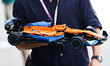 A man holds McLaren Lego model ahead the Formula 1 Hungarian Grand Prix at Hungaroring in...