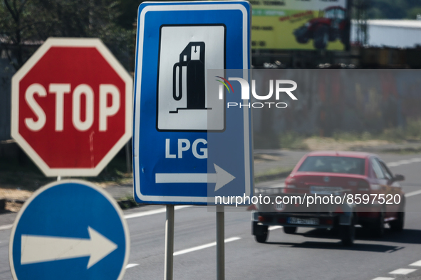 Stop and LPG signs are seen near a road in Krupina, Slovakia on July 28, 2022. 
