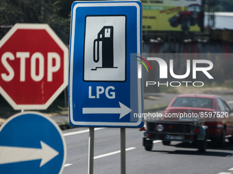 Stop and LPG signs are seen near a road in Krupina, Slovakia on July 28, 2022. (