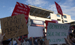 Climate activists with the Now or Never organization protest the Congressional Baseball Ga...