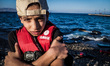 Hundreds of refugees continue to arrive on the Greek Island of Kos from Bodrum, Turkey, on...