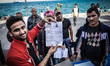 Hundreds of refugees continue to arrive on the Greek Island of Kos from Bodrum, Turkey, on...