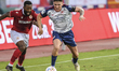 Adam O'Reilly (white) of St Patrick's Athletic chased by Duckens Nazon of CSKA Sofia durin...